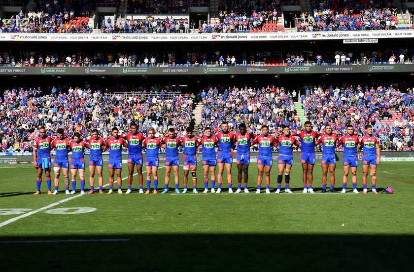The Knights arm-in-arm for an Anzac Round clash at McDonald Jones Stadium in 2022.