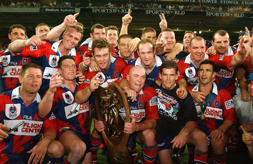 Two-time premiers: The 2001 side celebrate with the team song following a 30-24 win over Parramatta in the Grand Final in front of over 90,000 people at Telstra Stadium.