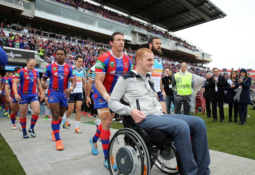 The game together to celebrate Alex McKinnon's career for Rise for Alex round following a devastating injury during the 2014 season.