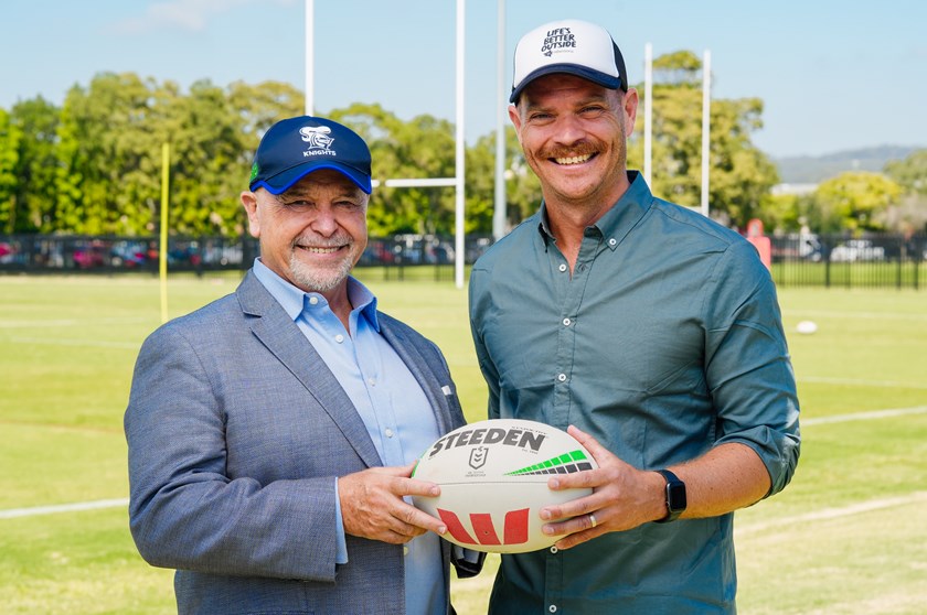 Newcastle Knights Chief Executive Officer, Mr Philip Gardner, poses with Reflections Chief Marketing Officer, Mr Peter Chapman.