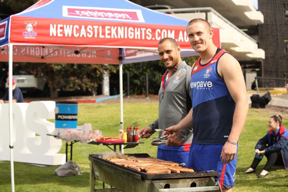 Jack Stockwell and Jeremy Smith volunteer for barbecue duties at Wednesday's exclusive Members event.  