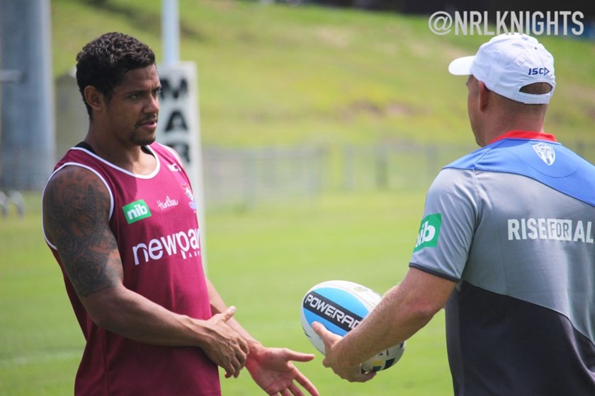 Dane Gagai talks tactics with head coach Nathan Brown.